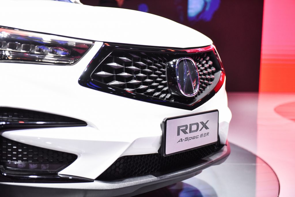 A white Acura RDX A-Spec car is on display during the 17th Guangzhou International Automobile Exhibition at China Import and Export Fair Complex