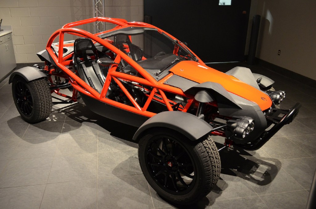 A red-caged Ariel Nomad Sport in a garage