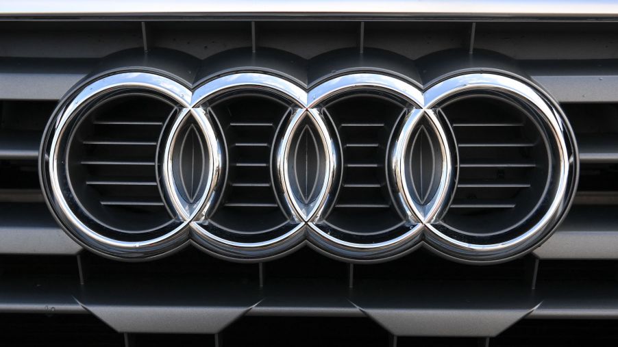 The silver logo of the German automaker Audi is seen on a car's grille on March 18, 2021, at its headquarters in Ingolstadt, Germany