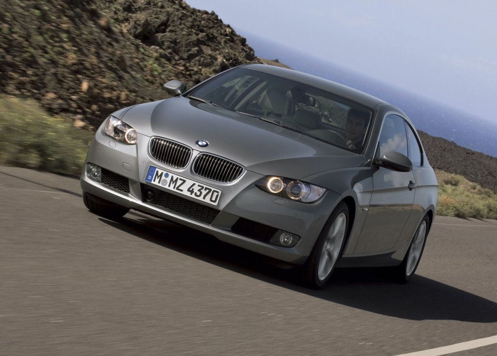 A front shot of a 2008 BMW 328i driving