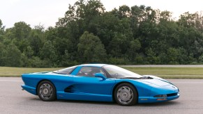 An image of a Mid-Engined Chevrolet Corvette concept parked outdoors.