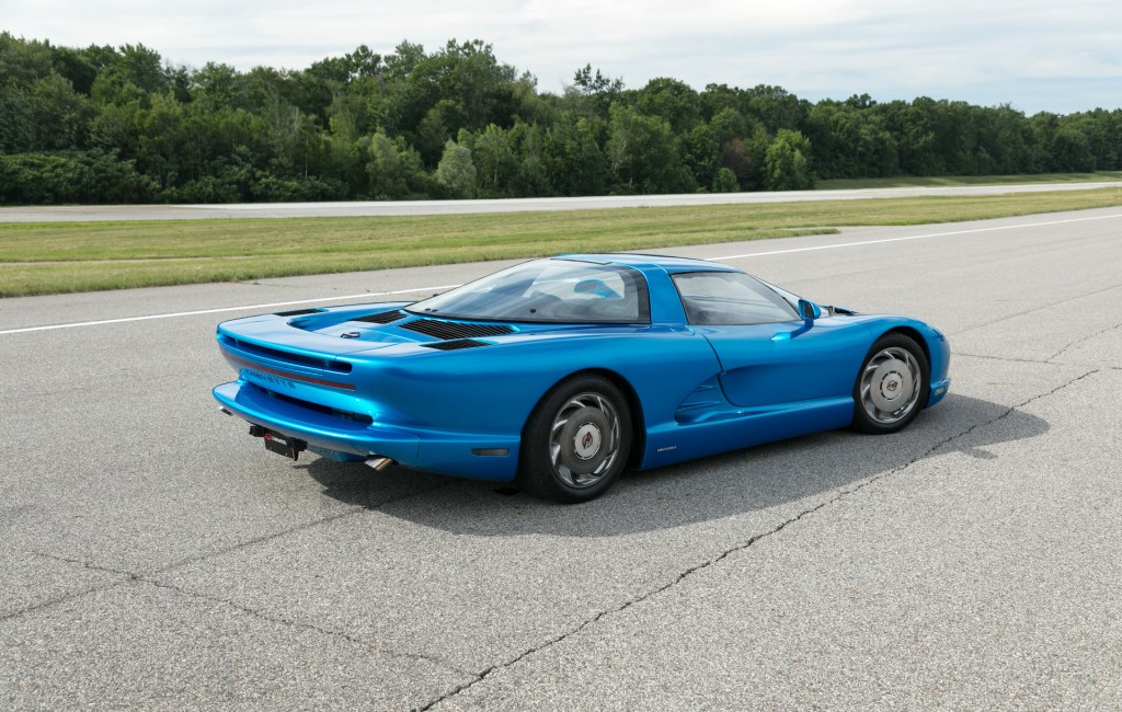 An image of a Mid-Engined Chevrolet Corvette concept parked outdoors.