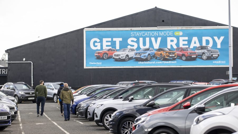 Potential customers walk around Charles Hurst Usedirect used car dealership on Boucher Road in Belfast as restrictions in Northern Ireland ease allowing new and used cars sales