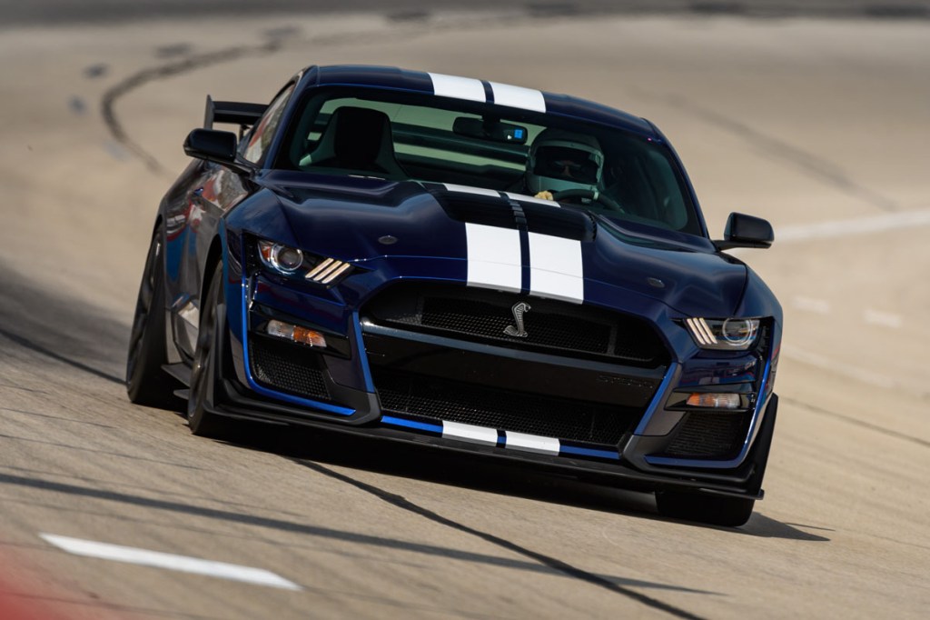 a dark blue 2021 Ford Mustang Shelby GT500 on the track