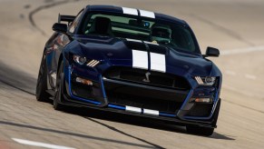 a dark blue 2021 Ford Mustang Shelby GT500 on the track