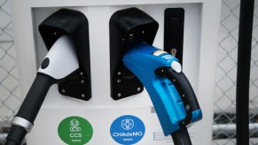 Electric vehicle chargers at a charging station