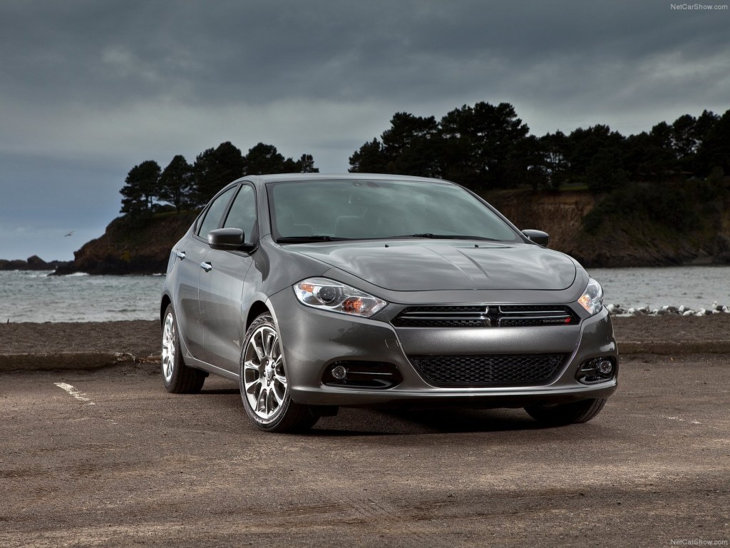 An image of a Dodge Dart parked outside.
