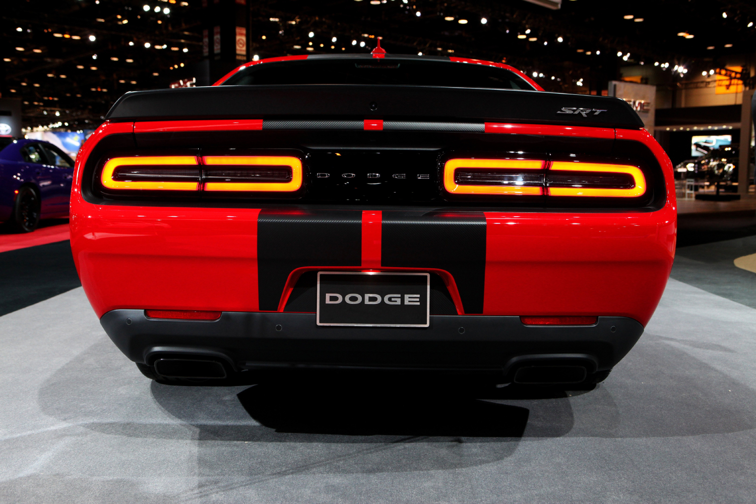 A Dodge Challenger SRT Hellcat on display at an auto show