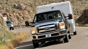 Ford's 2011 F250 Super Duty Power Stroke Diesel pickup truck is photographed pulling a 17,000-pound utility trailer up a mountain grade during a media unveiling in Yarnell, Arizona, U.S., on Tuesday, March 2, 2010.