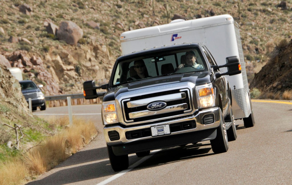 Ford's 2011 F250 Super Duty Power Stroke Diesel pickup truck is photographed pulling a 17,000-pound utility trailer up a mountain grade during a media unveiling in Yarnell, Arizona, U.S., on Tuesday, March 2, 2010.
