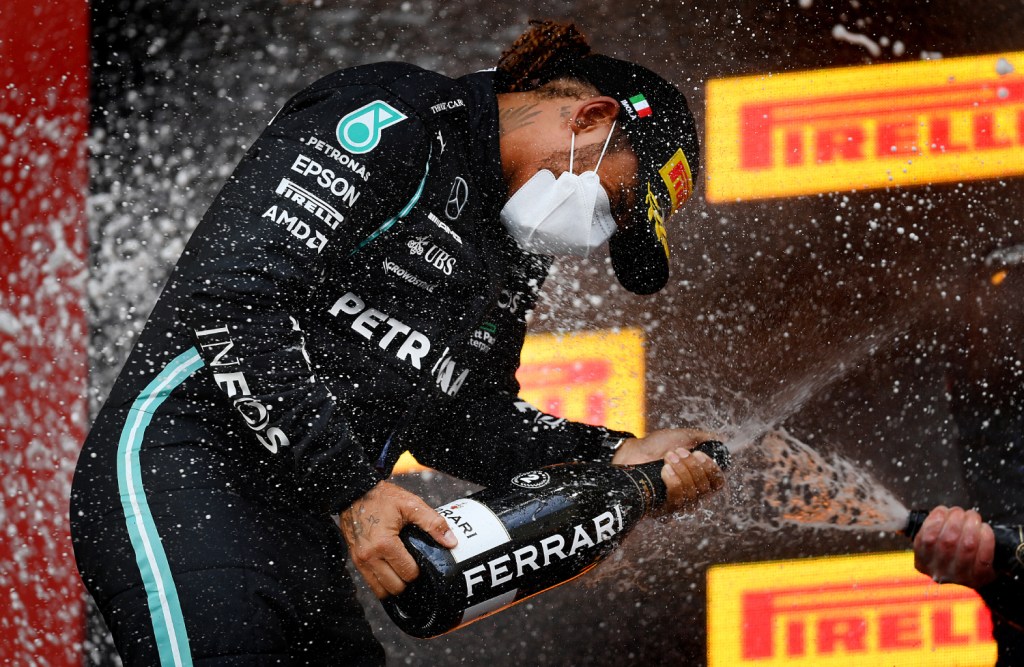 Formula 1 driver Lewis Hamilton on the podium