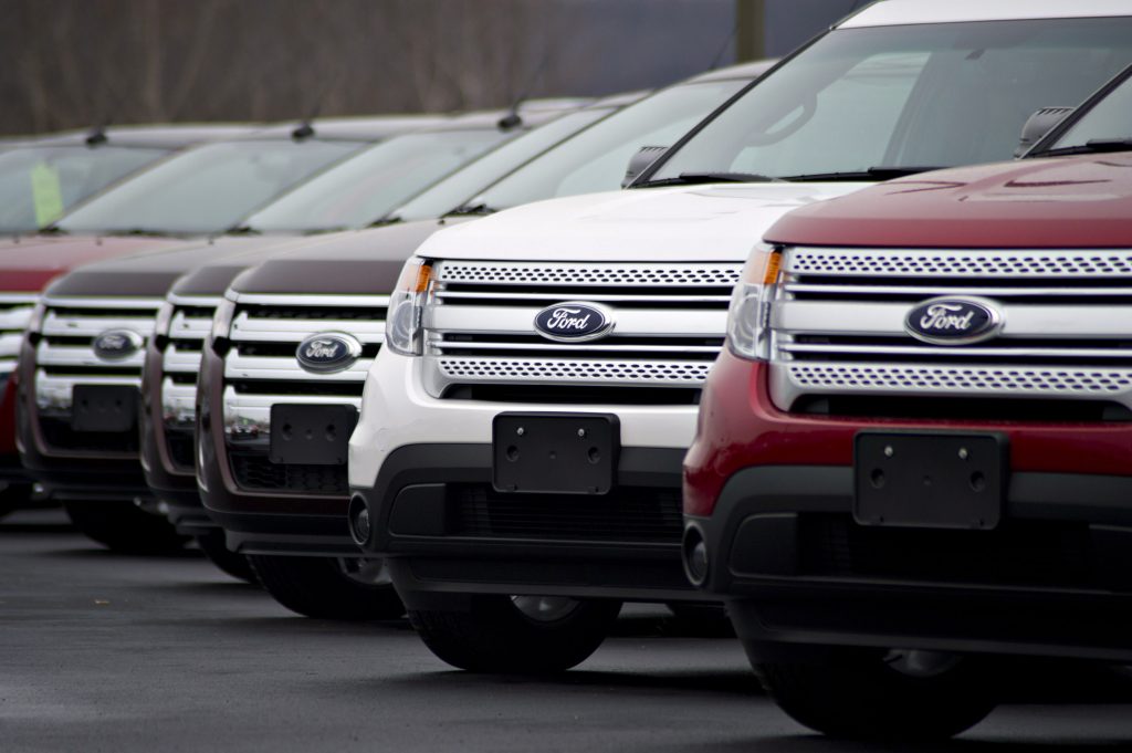 Ford Explorer SUVs on display at a dealership