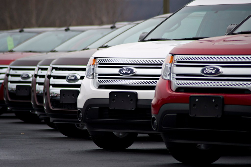 Ford Explorer SUVs on display at a dealership