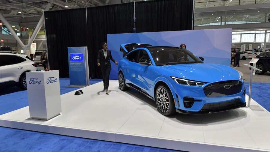 A blue electric Ford Mustang Mach-E is seen at the 2020 New England Auto Show Press Preview at Boston Convention & Exhibition Center