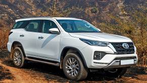 The 2021 Toyota Fortuner driving on a dirt road