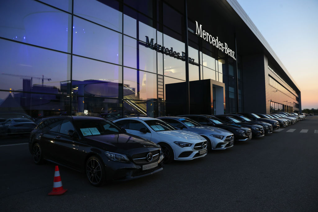 A Mercedes-Benz sales facility with new models parked neatly out front, ready for test driving