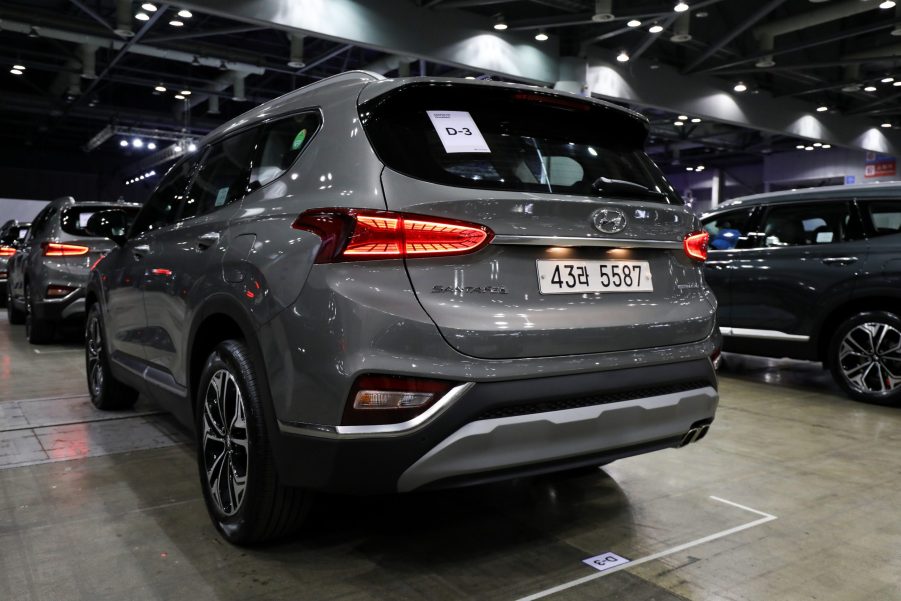 A gray Hyundai Motor Co. Santa Fe sport utility vehicle (SUV) stands on display during a launch event for the updated vehicle