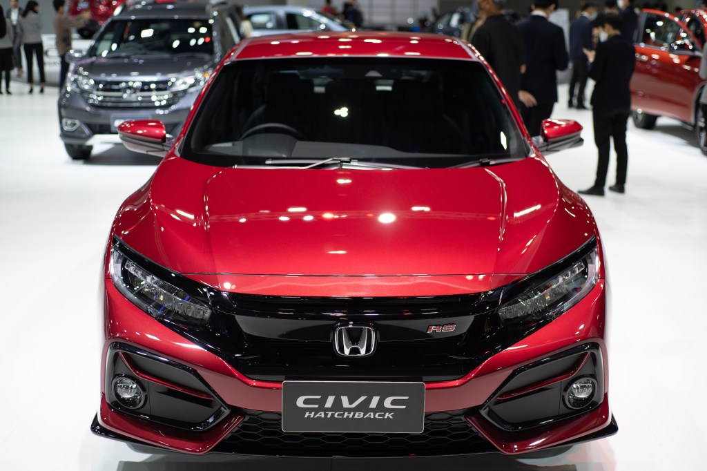 Red Honda Civic Hatchback 2020 on display during the Thailand International Motor Expo 2020