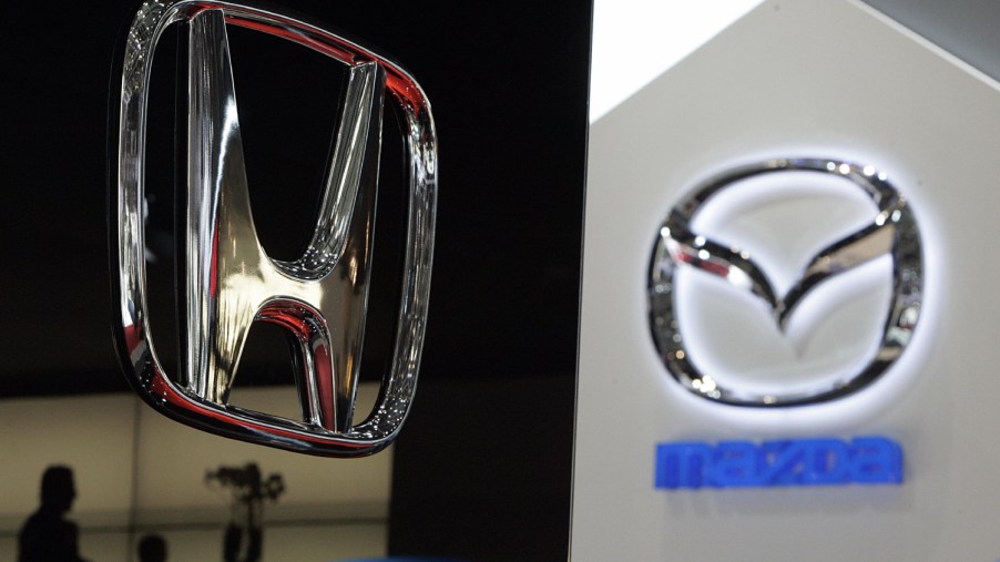 Honda and Mazda logos on display