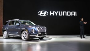 Sangyup Lee, senior vice president and head of design at Hyundai Motor Co., speaks while standing next to the Hyundai Palisade sports utility vehicle (SUV) during AutoMobility LA
