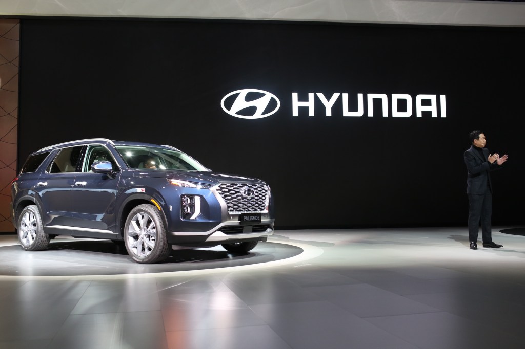 Sangyup Lee, senior vice president and head of design at Hyundai Motor Co., speaks while standing next to the Hyundai Palisade sports utility vehicle (SUV) during AutoMobility LA