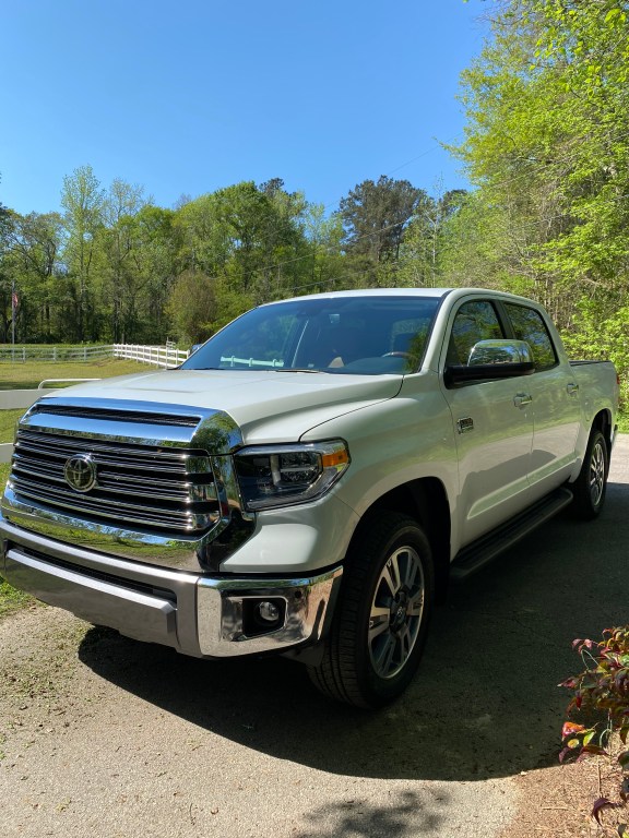 The 2021 Toyota Tundra 1794 CrewMax Edition parked on a farm