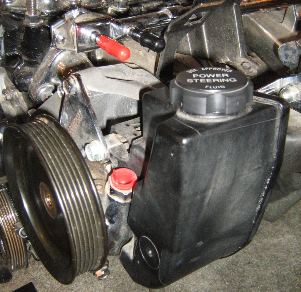 A power steering reservoir on a Jeep 