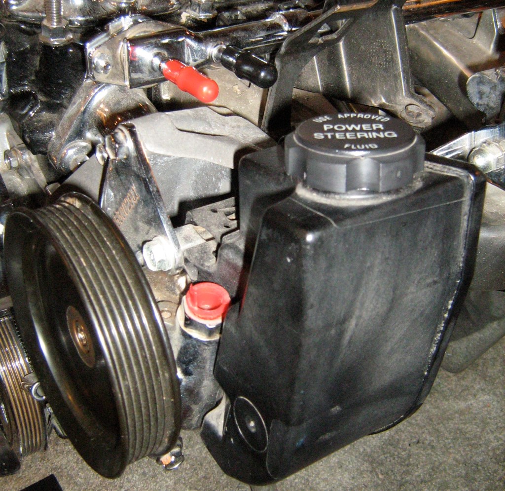 A power steering reservoir on a Jeep 