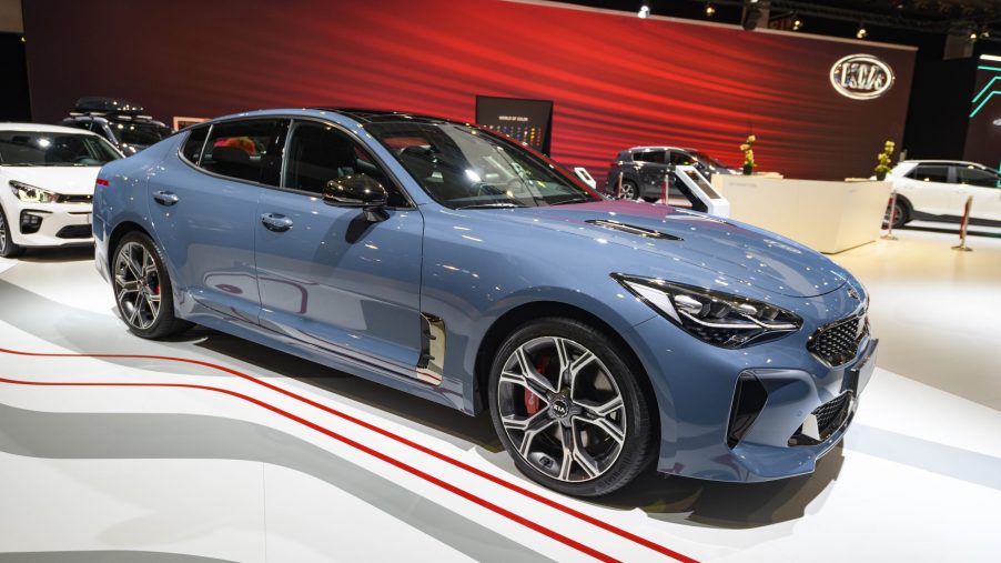 Blue Kia Stinger compact executive 4-door fastback on display at Brussels Expo