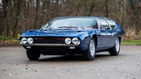 An image of a Lamborghini Espada parked outside.