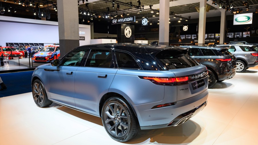 Blue Land Rover Range Rover Velar SVAutobiography Dynamic Edition P550 crossover luxury SUV on display at Brussels Expo
