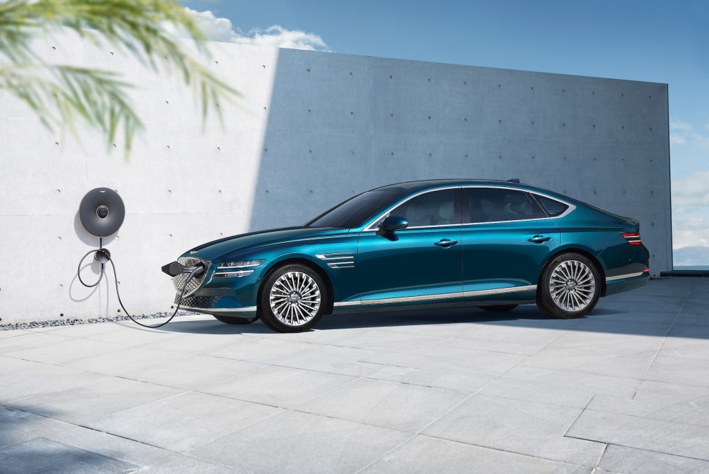 An image of a Genesis Electrified G80 parked outside.