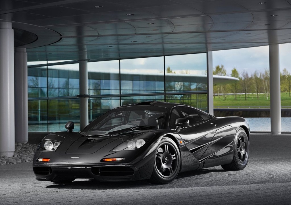 An image of a McLaren F1 parked outside.