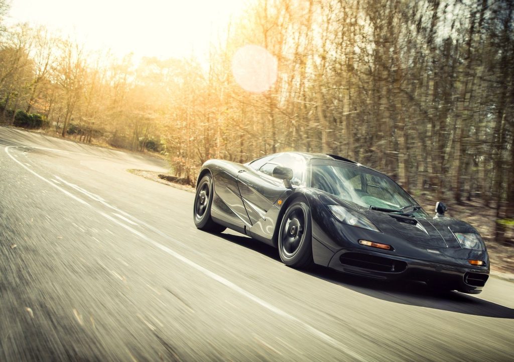 An image of a McLaren F1 out on the road.
