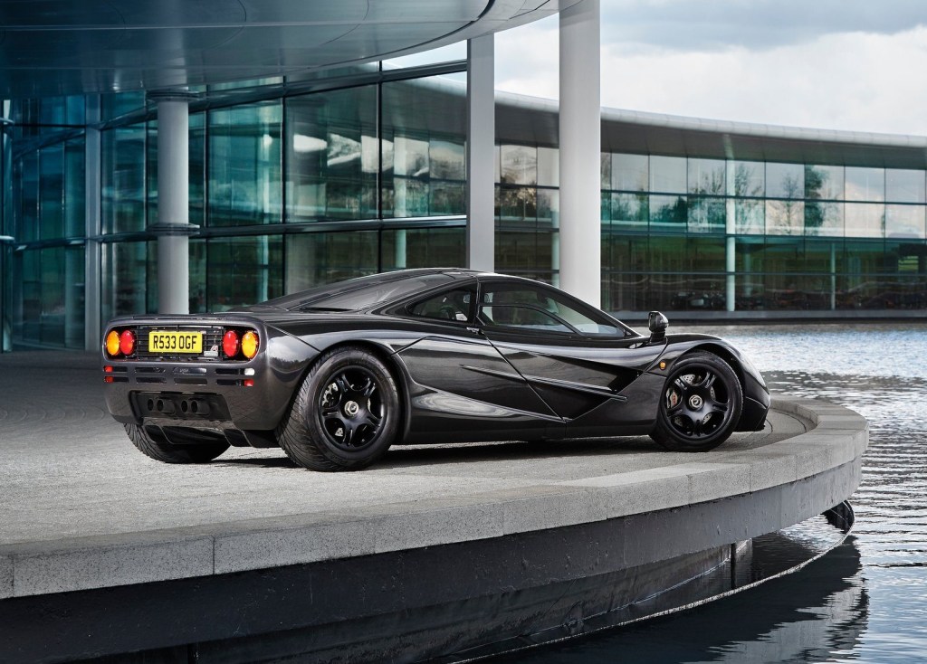 An image of a McLaren F1 parked outside.