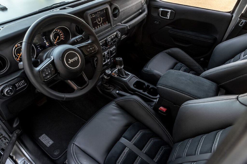 The black-Nappa-leather-upholstered front seats and dashboard of a Next Level Jeep Gladiator 6x6