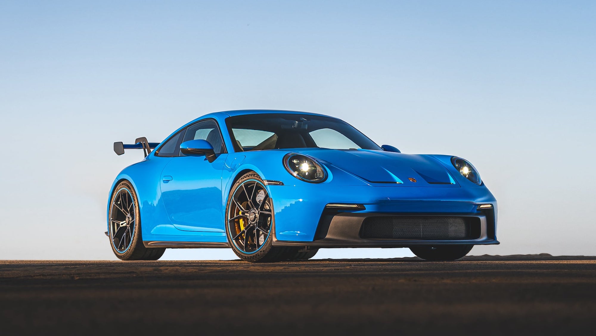 2022 Porsche 911 GT3 in Shark Blue parked on the race track