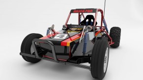 The black-and-red Tamiya Wild One MAX electric off-road buggy