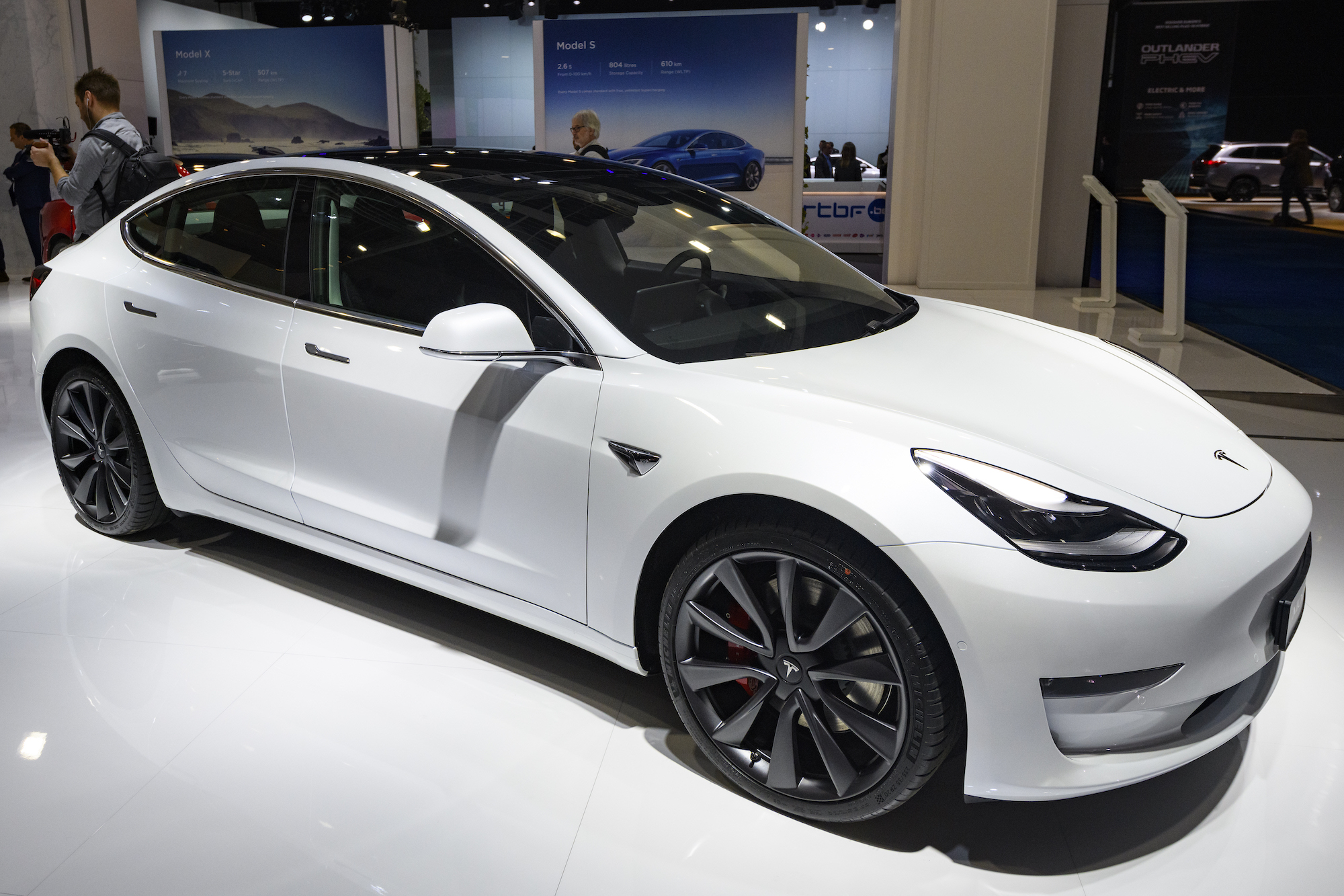 A white Tesla Model 3 compact EV on display at Brussels Expo on January 9, 2020, in Brussels, Belgium