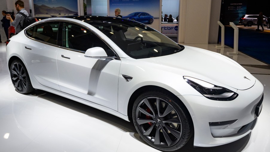 A white Tesla Model 3 compact EV on display at Brussels Expo on January 9, 2020, in Brussels, Belgium