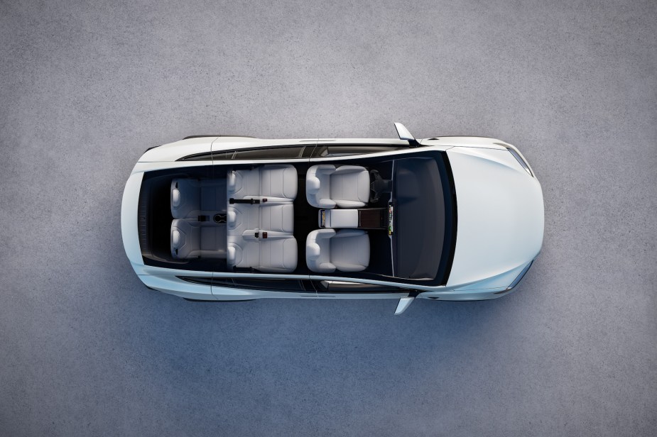 An overhead view of a white Tesla Model X electric seven-seat SUV