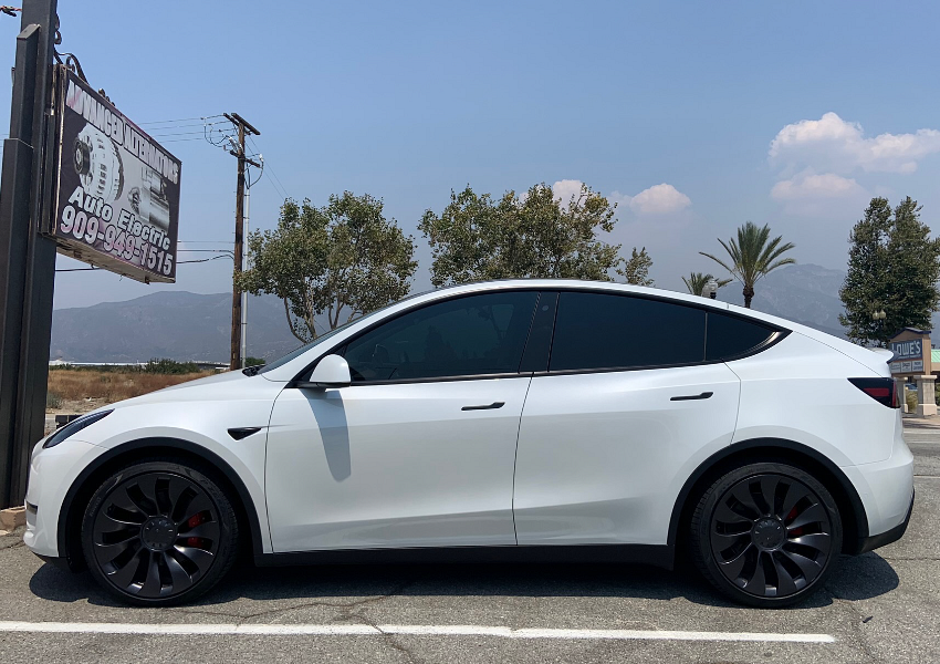 A Tesla Model Y with front tinted windows