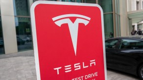 A Tesla electric vehicle test drive sign
