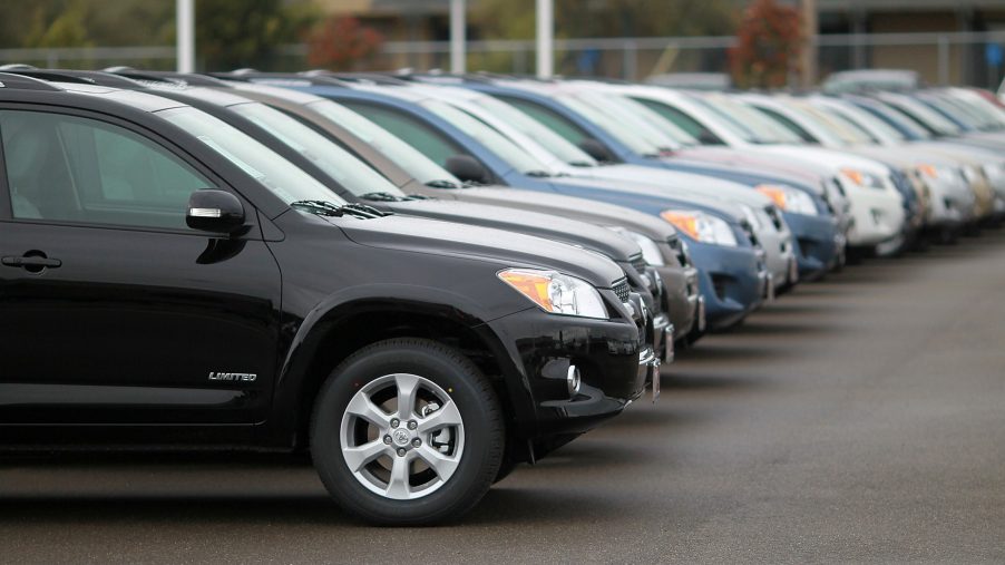 A row of Toyota SUVs on display at a car dealership