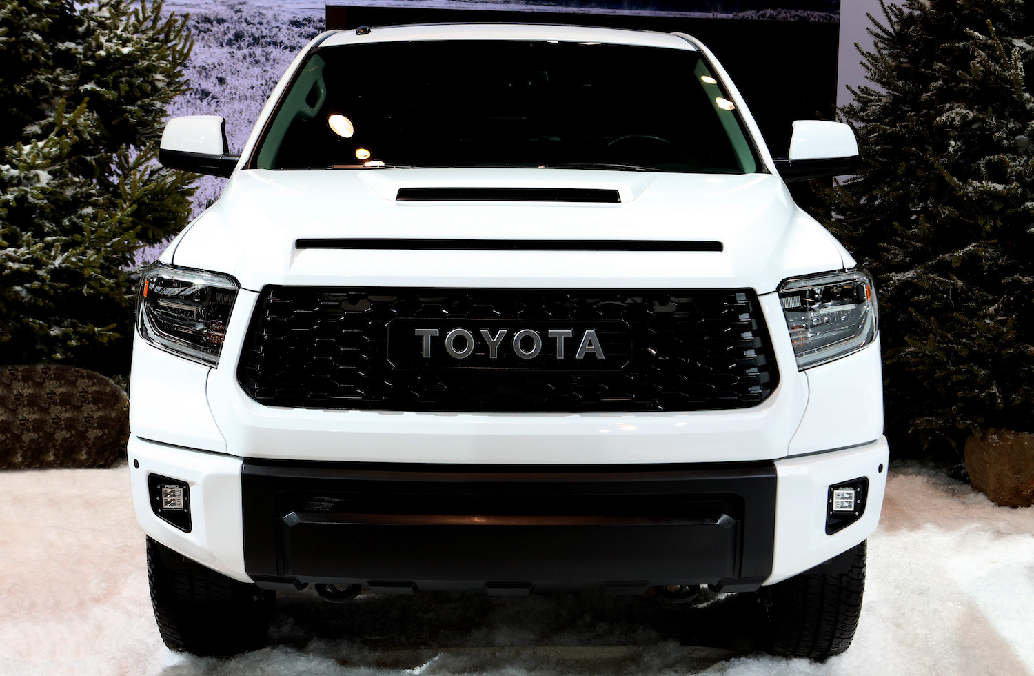 A white Toyota Tundra at an auto show