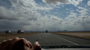 A car road trip west across the desert and mountains in New Mexico on April 18, 2021