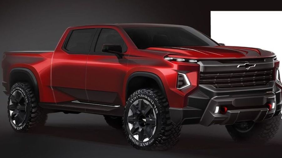 The all-new electric Chevy Silverado in red against a black back ground. The electric pickup truck is going to be a real contender.