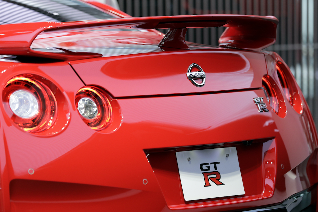 The back end of a red nissan gtr 