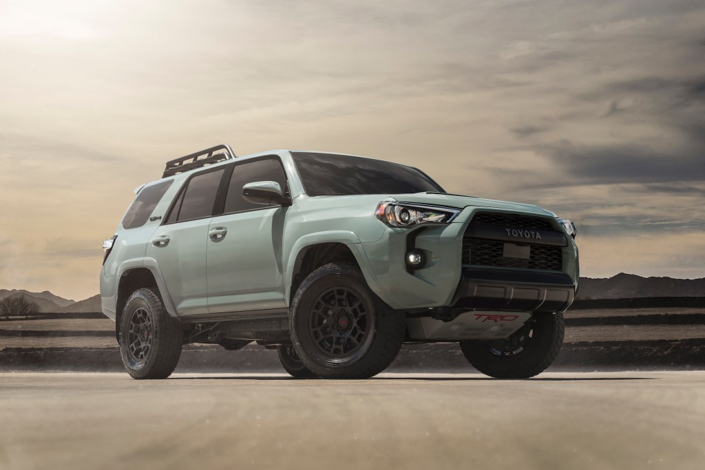 The 2021 Toyota 4Runner TRD Pro SUV in the Lunar Rock color in a press photo desert scene