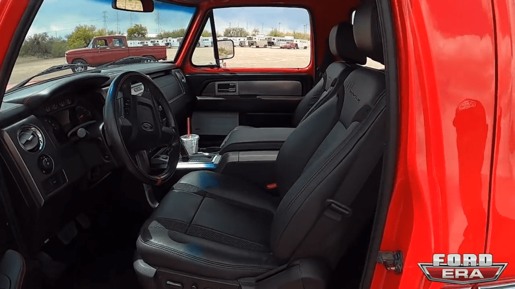Restomod 1979 Ford Bronco in red with all Ford Raptor interior